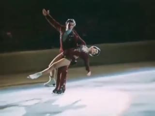 figure skating. irina rodnina and alexander zaitsev perform their famous ice dance kalinka {1974}